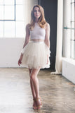This design is inspired by Carrie Bradshaw of Sex and the City.  This skirt features 6 cascading layers of tulle.  Fully lined with a hidden back zipper.