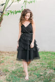 Exude evening drama in this gorgeous midi tulle skirt. The cascading ruffles give this skirt a special look and feel and lends a perfect texture to your outfit.      Fully lined with a hidden back zipper     All length is approximately 30"